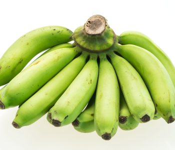 Green banana fruit isolated on white background